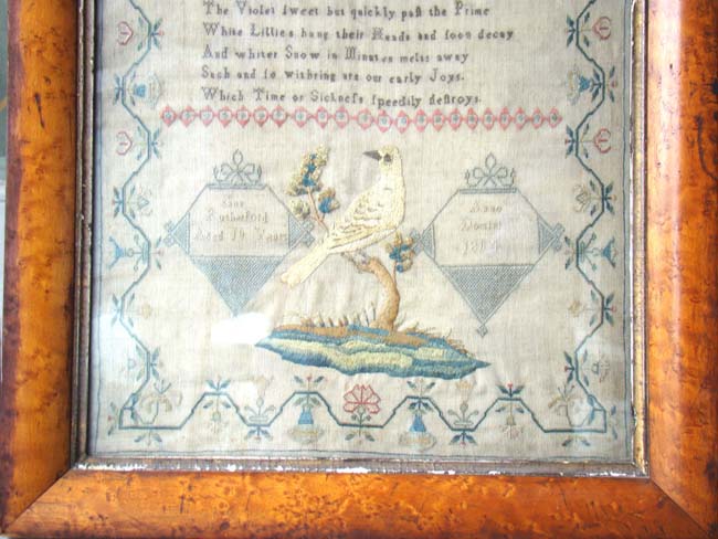 An English Schoolgirl Needlework Sampler signed "Jane Rutherford, Aged 10, 1804."